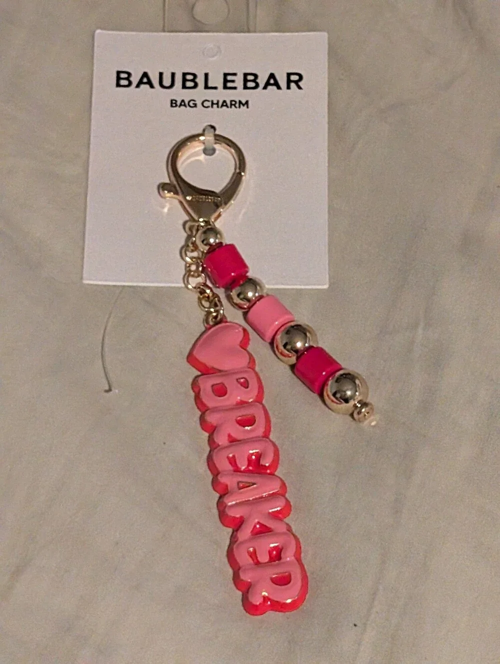 BaubleBar Pink Logo Bag Charm Keychain